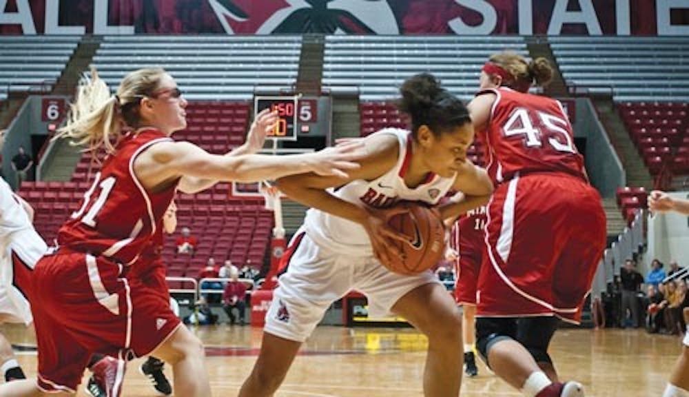 Freshman guard Nathalie Fontaine contends with Miami over control of the ball on Jan. 10. Fontaine put up 18 points for Ball State against Northern Illinois on Sunday, tying her career high. DN FILE PHOTO JONATHAN MIKSANEK