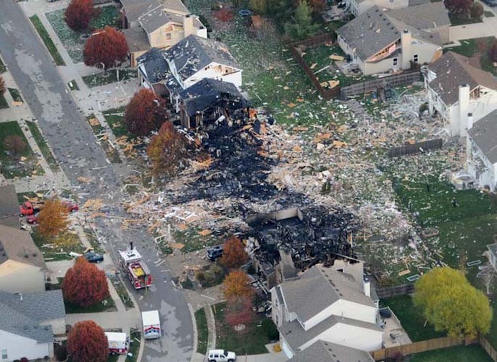 Aerial views of the two homes that were leveled and the numerous neighboring homes that were damaged from the explosion late Saturday night in the Richmond Hill subdivision, near Stop 11 and Sherman Drive. PHOTO PROVIDED BY MATT KRYGER AND THE INDIANAPOLIS STAR