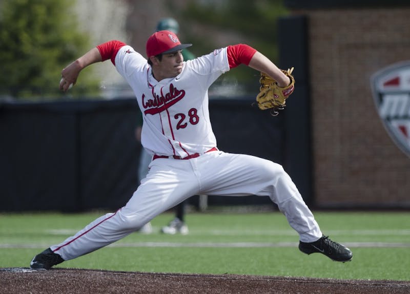 Sophomore pitcher TJ Harmon pitches the ball during the game against Ohio University on April 2 at the First Merchants Ballpark Complex. Ball State lost 10-0, bringing the Cardinals losing streak to eight games in a row. Emma Rogers // DN