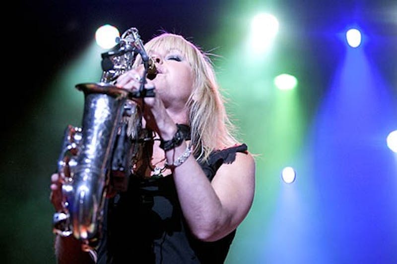 Saxophonist Mindi Abair takes center stage on Tuesday evening at Emens Auditorium. The concert was part of the Music for All Summer Symposium and was free to all the students who attended the camp. DN PHOTO JORDAN HUFFER