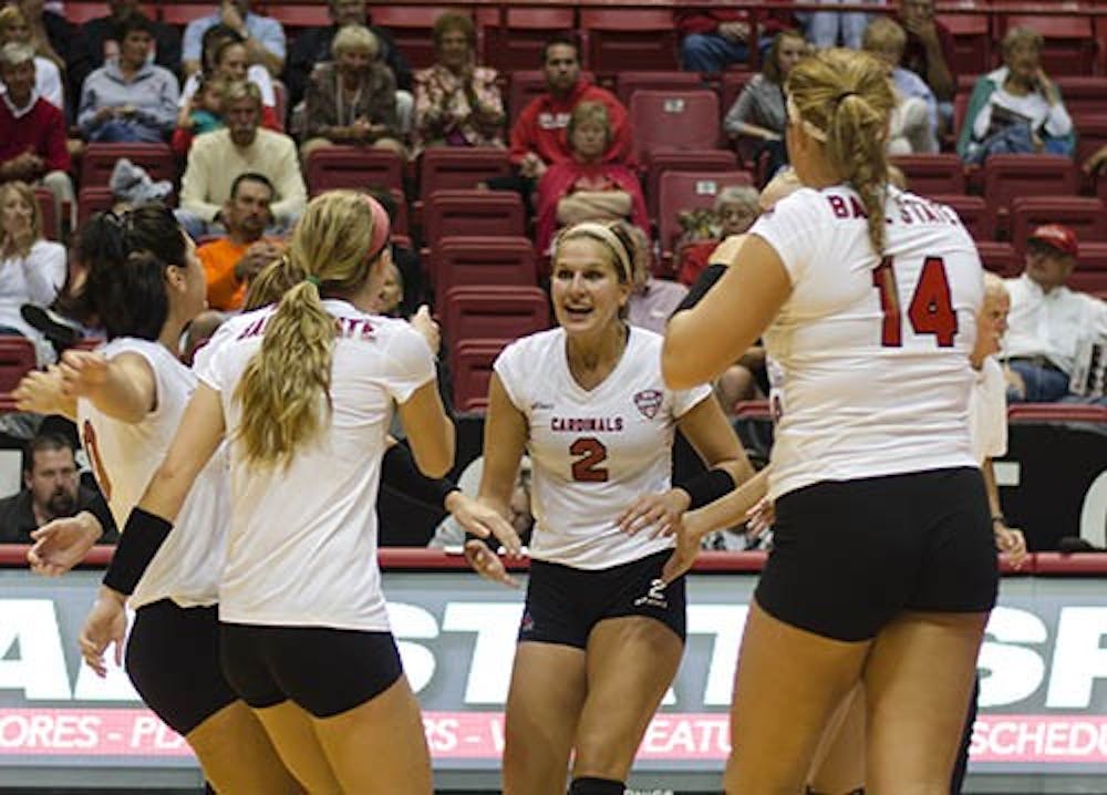 The team celebrates with sophomore outside hitter Alex Fuelling after she got a kill against IUPUI on Sept. 17 at Worthen Arena. The Ball State women’s volleyball team will travel to Toledo Thursday. DN FILE PHOTO BREANNA DAUGHERTY