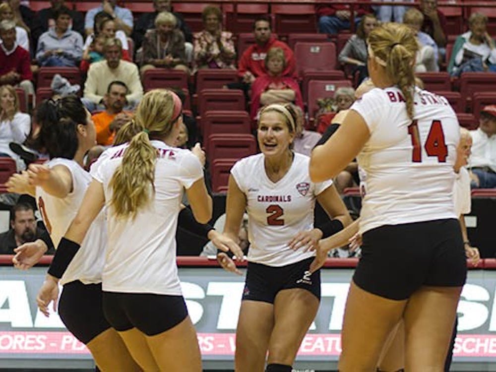 The team celebrates with sophomore outside hitter Alex Fuelling after she got a kill against IUPUI on Sept. 17 at Worthen Arena. The Ball State women’s volleyball team will travel to Toledo Thursday. DN FILE PHOTO BREANNA DAUGHERTY