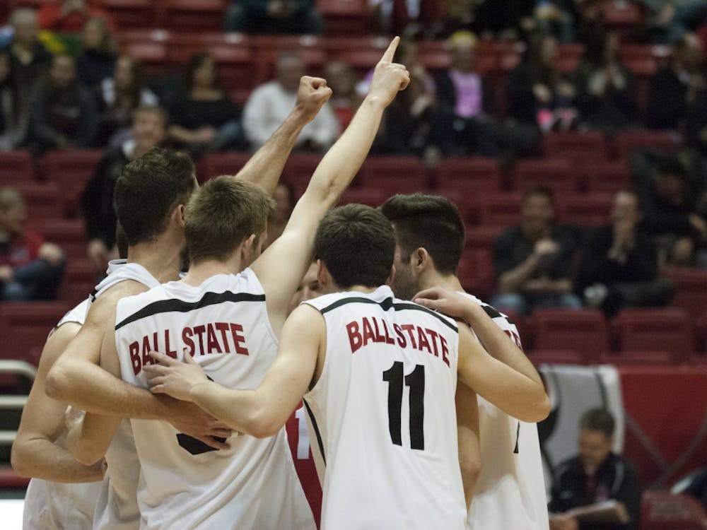 On Thursday Feb. 11, the Ball State men's volleyball team hosted the IPFW Mastodons at John E. Worthen Arena. The Cardinals celebrate in the huddle after beating the Mastodons in three games. DN PHOTO ALLISON COFFIN