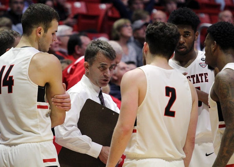 Head Coach James Whitford talks to the Cardinals during a timeout with 23.1 seconds remaining in the second half during Ball State’s game against Stony Brook on Nov. 17 in John E. Worthen Arena. The Cardinals won 87 to 76. Paige Grider, DN