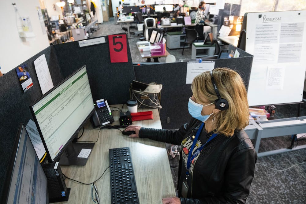 Crisis Line phone workers take calls at Crisis Connections Friday, April 8, 2022. Soon they&#x27;ll be taking mental health calls made to the new 988 services. (Dean Rutz/The Seattle Times/TNS)