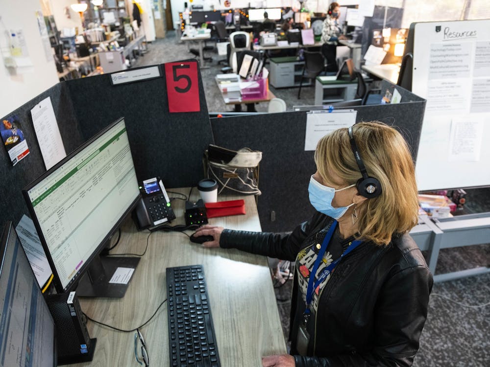Crisis Line phone workers take calls at Crisis Connections Friday, April 8, 2022. Soon they&#x27;ll be taking mental health calls made to the new 988 services. (Dean Rutz/The Seattle Times/TNS)