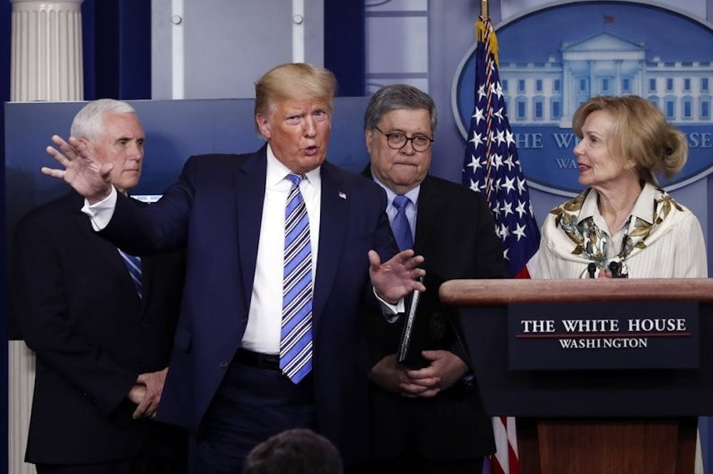 <p>President Donald Trump gestures as he asks a question to Dr. Deborah Birx, White House coronavirus response coordinator, during a briefing about the coronavirus in the James Brady Briefing Room March 23, 2020, in Washington. <strong>(AP Photo/Alex Brandon)</strong></p>