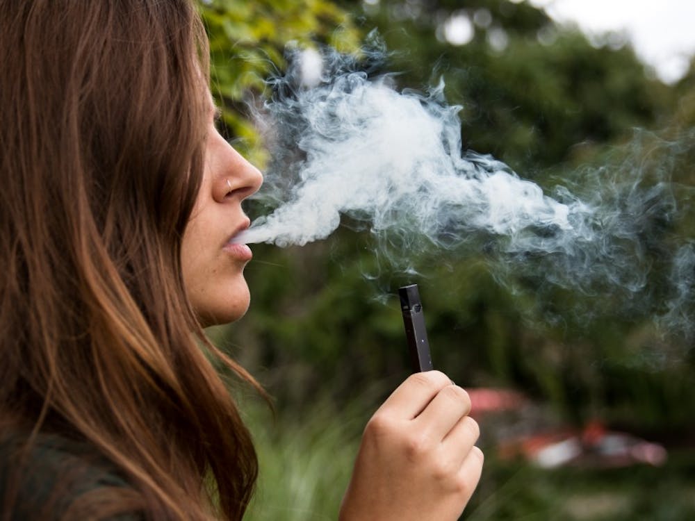 New Ball State study shows increasing cigarette taxes lead to a decrease in e-cigarette purchases. The study found that a $1 increase in cigarette excise tax reduces the probability that a household purchases e-cigarette products by about 22 percent. Eric Pritchett, DN
