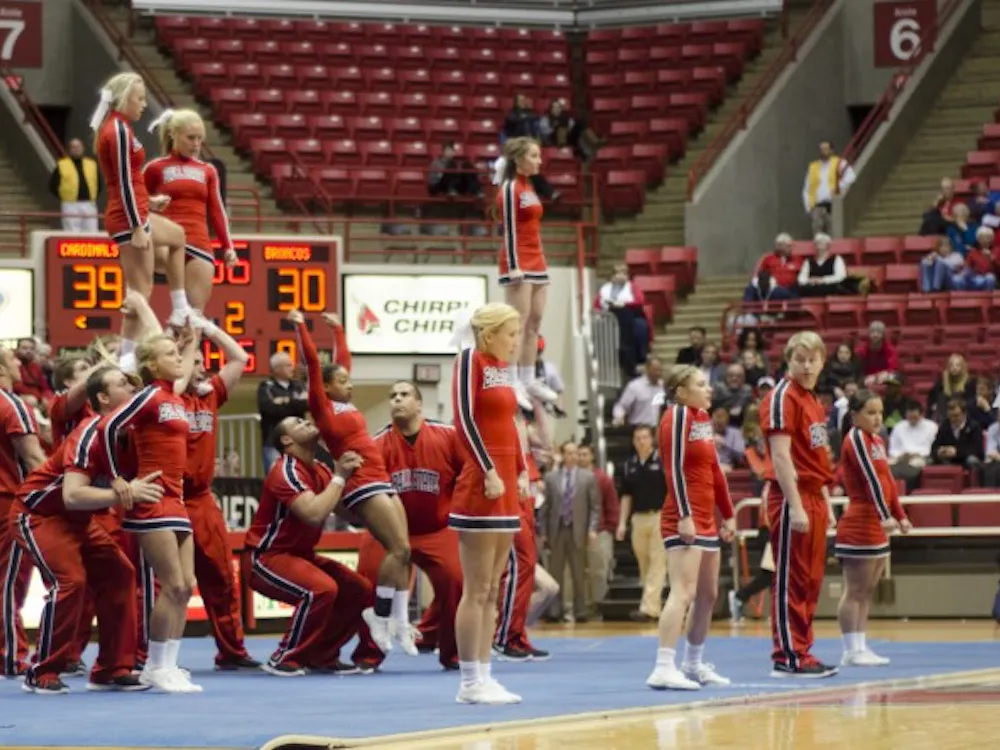 Ball State cheerleaders perform a routine during halftime of the men's basketball game against Western Michigan on Feb. 26 at Worthen Arena. DN PHOTO AUDREY ADDINGTON