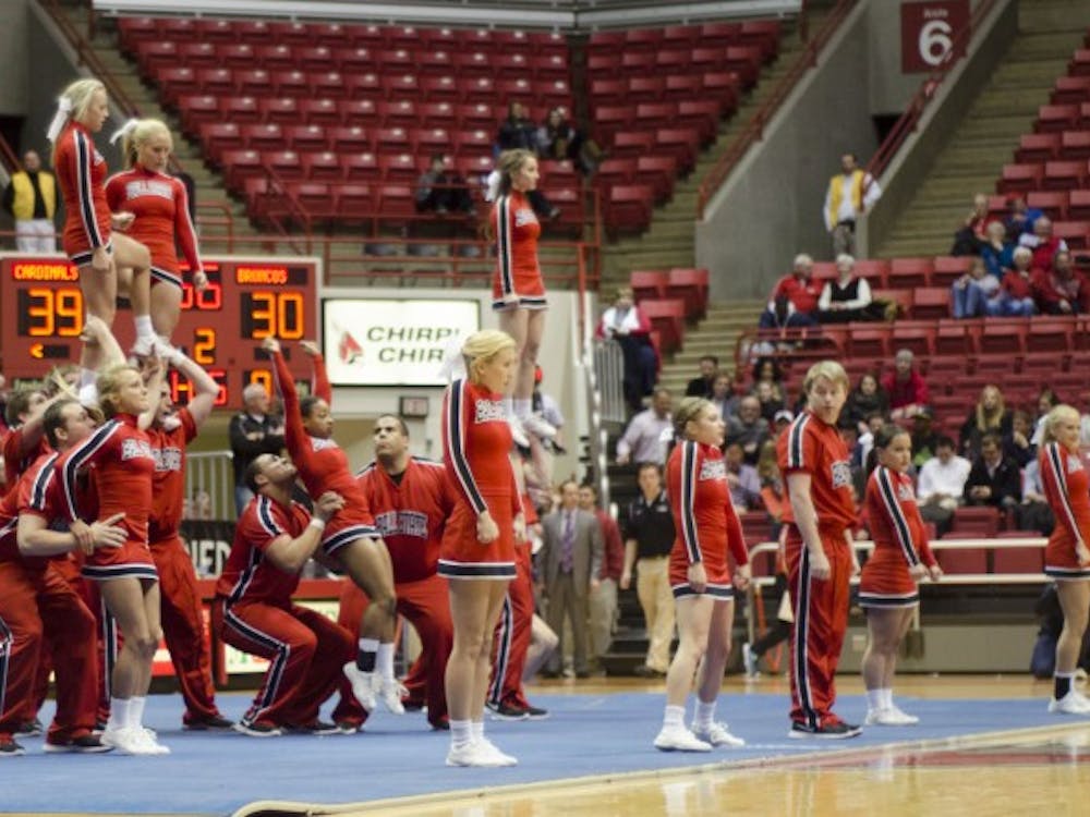 Ball State cheerleaders perform a routine during halftime of the men's basketball game against Western Michigan on Feb. 26 at Worthen Arena. DN PHOTO AUDREY ADDINGTON 