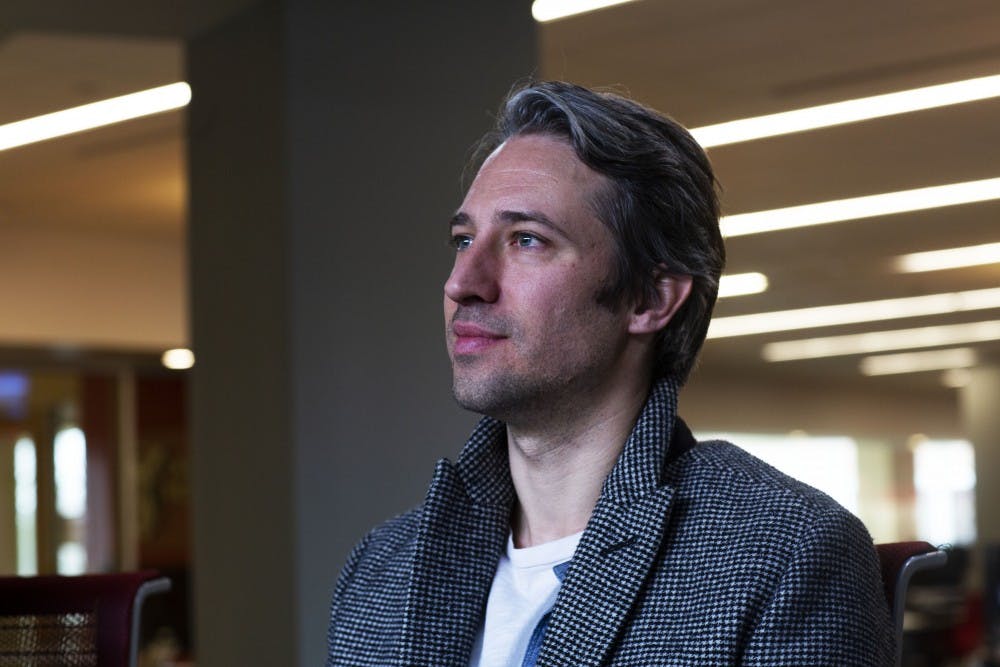 Ball State alumnus Travis Abels speaks about his creative works Jan. 17, 2019, in the L.A Pittenger Student Center Ballroom. Throughout his career, Abels has worked on trailers for films such as "The Imitation Game" and "La La Land." Scott Fleener, DN