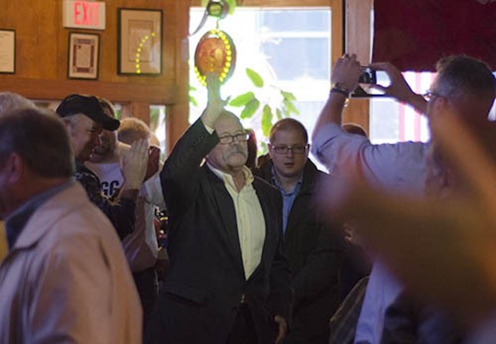 Former gubernatorial candidate John Gregg speaks to a crowd at the Fickle Peach in Muncie in October. Gregg, who ran on the democratic ticket, is considering running again due to his large show of supporters. DN FILE PHOTO COREY OHLENKAMP