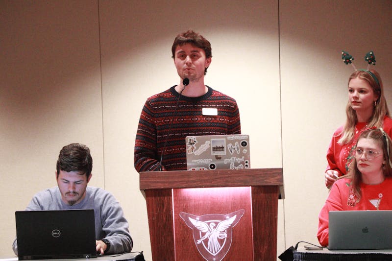 Treasurer Casey Rockel presents to the senate Dec. 4 during the Student Government Association meeting at the L.A. Pittenger Student Center. Rockel discussed how much money is left in the budget for next semester projects. Shelby Anderson, DN