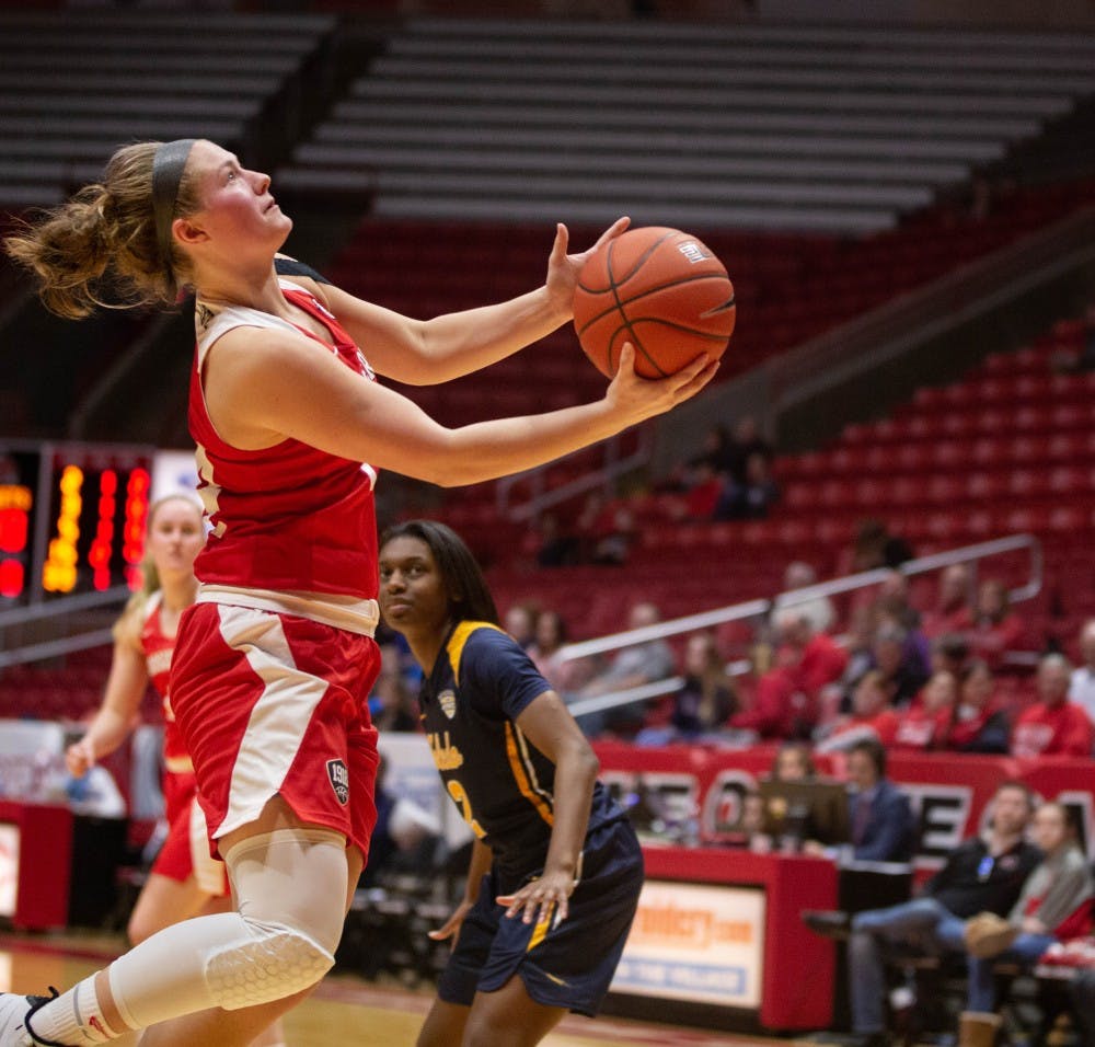 Senior Jasmin Samz goes for a layup during the game against Toledo Feb. 23, 2019 in John E. Worthen Arena. Ball State wore the historic Hoosieroon uniform for the game. Scott Fleener, DN
