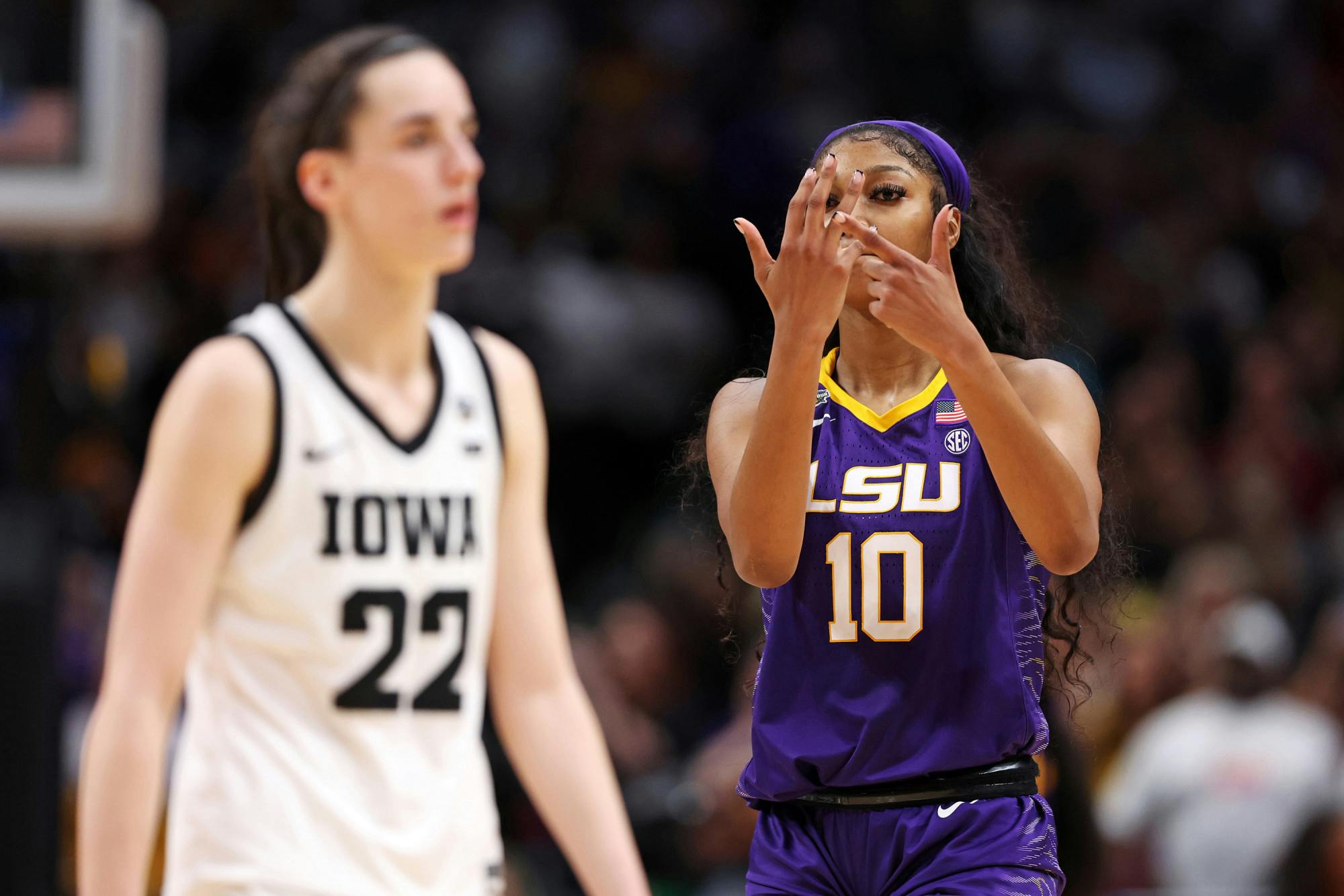 LSU's Angel Reese (10) gestures toward Iowa's Caitlin Clark (22) during the fourth quarter of the NCAA Tournament championship game at American Airlines Center on April 2, 2023, in Dallas. (Maddie Meyer/Getty Images/TNS)