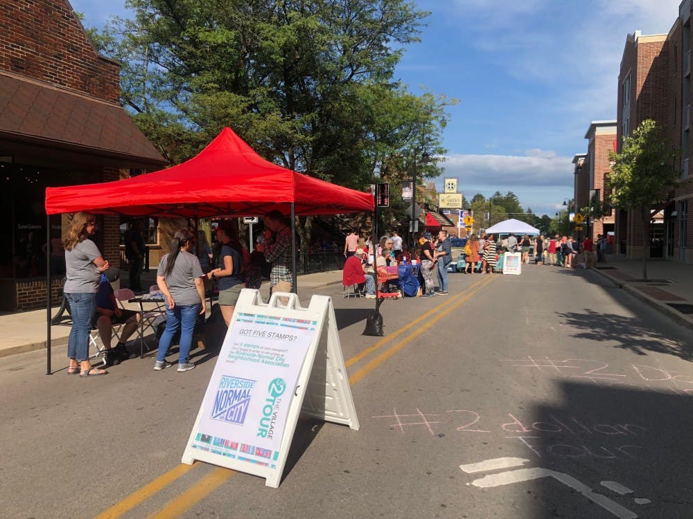 Several shops in the village set up tables outside their storefronts for students to shop at for the inaugural $2 Tour of the Village.