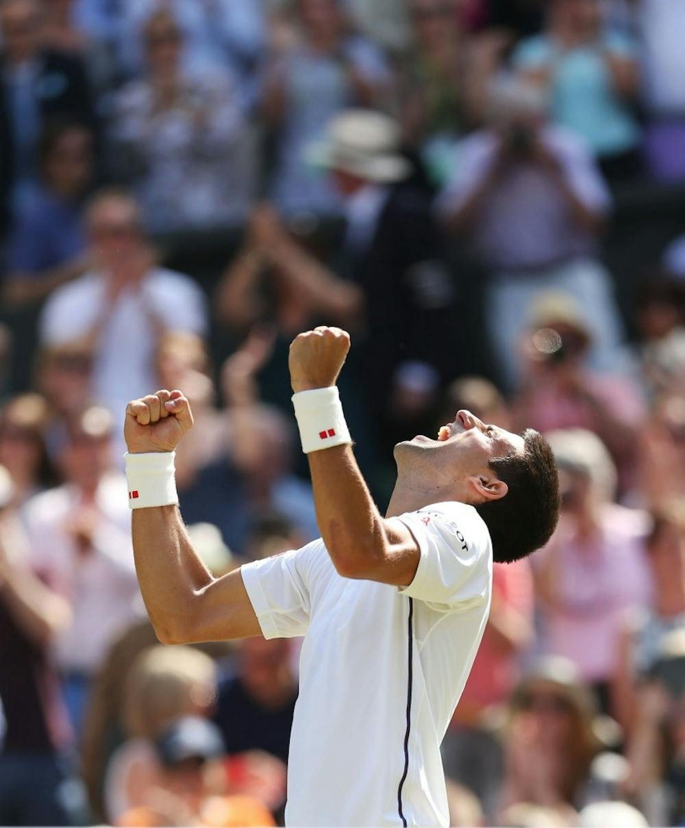 Novak Djokovic of Serbia celebrates his win against Bulgaria