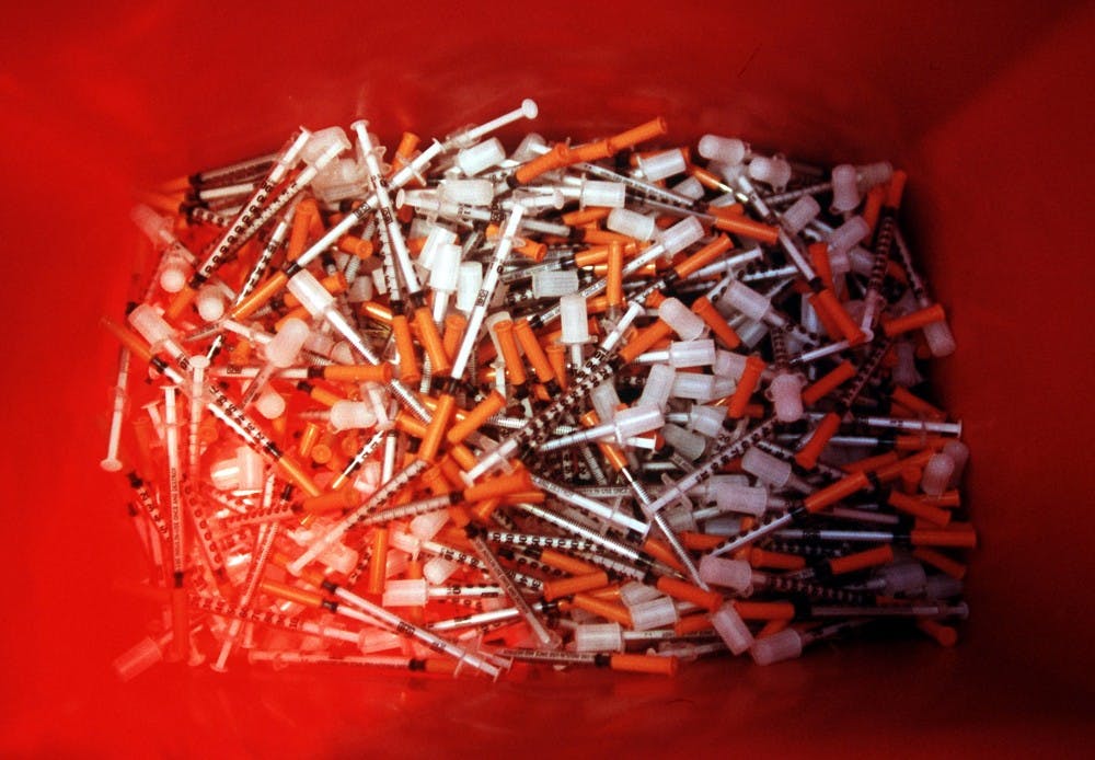 KRT LIFESTYLE STORY SLUGGED: HEALTH-NEEDLES KRT PHOTO BY TODD PANAGOPOULOS/CHICAGO TRIBUNE (September 12) Needles collected by the Chicago Recovery Alliance, one of about three dozen needle exchange programs in the United States. The Chicago program operates for several hours a week at eight different sites in the city. (mvw) 2003