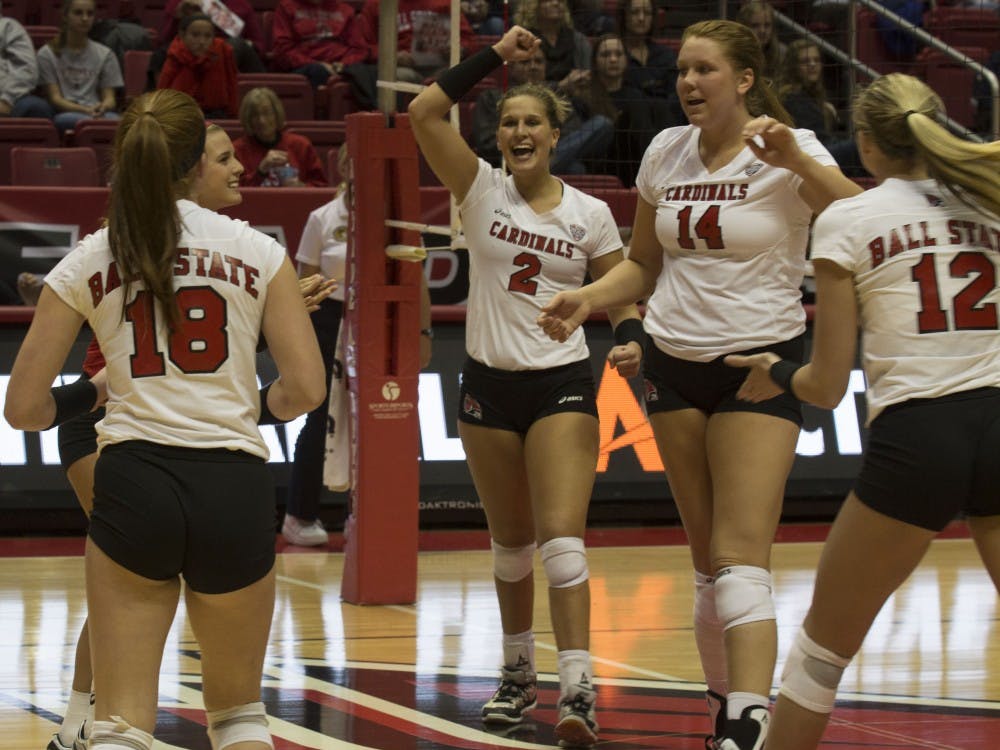 No. 2, Alex Fueling celebrates with her teammates after scoring against Toledo at Worthen Arena on October 29th, 2015.