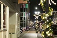 Canan Commons in downtown Muncie, Indiana, is lit up with warm festive colors Dec 1. This was a part of "LIGHT UP DWNTWN" as a part of the final First Thursday event of 2022. KwaTashea Marfo, DN