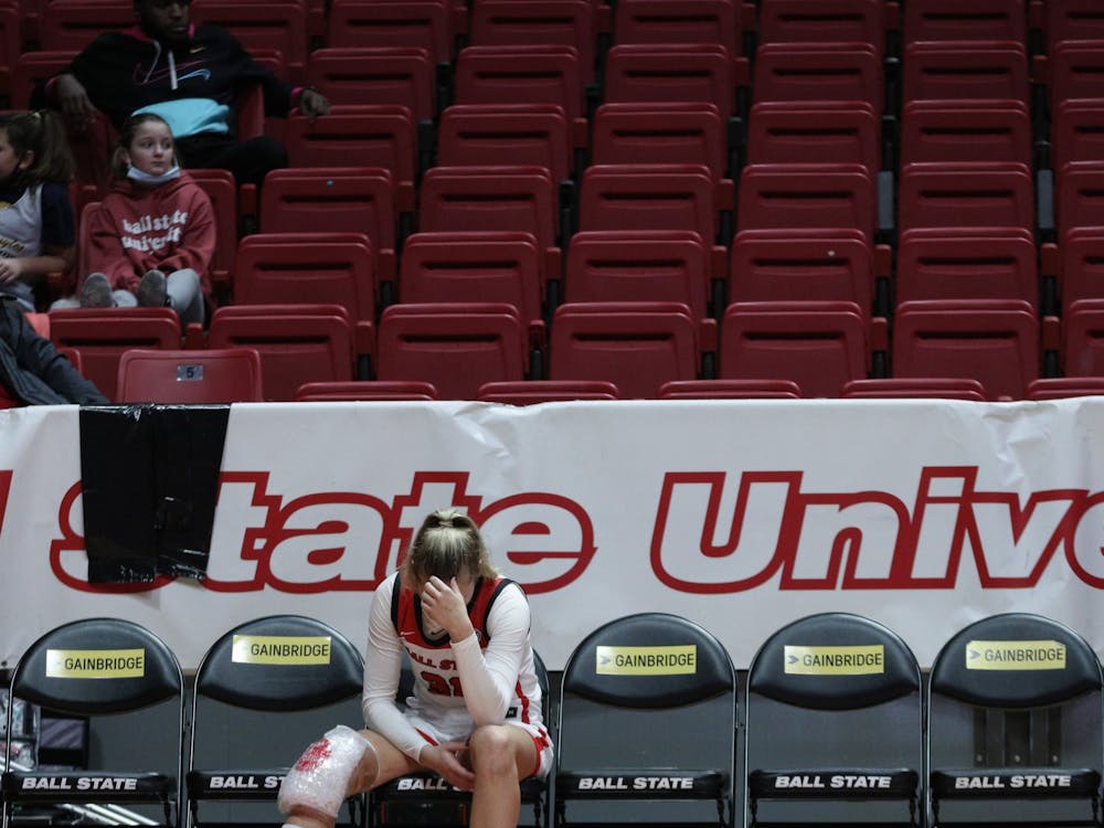 Redshirt junior Anna Clephane sits on the bench after suffering an injury to her right leg during a Ball State Women's Basketball game against Kent State University Jan. 9 at Worthen Arena. Clephane was injured after falling during an atempted layup in the second half of the game. Eli Houser, DN