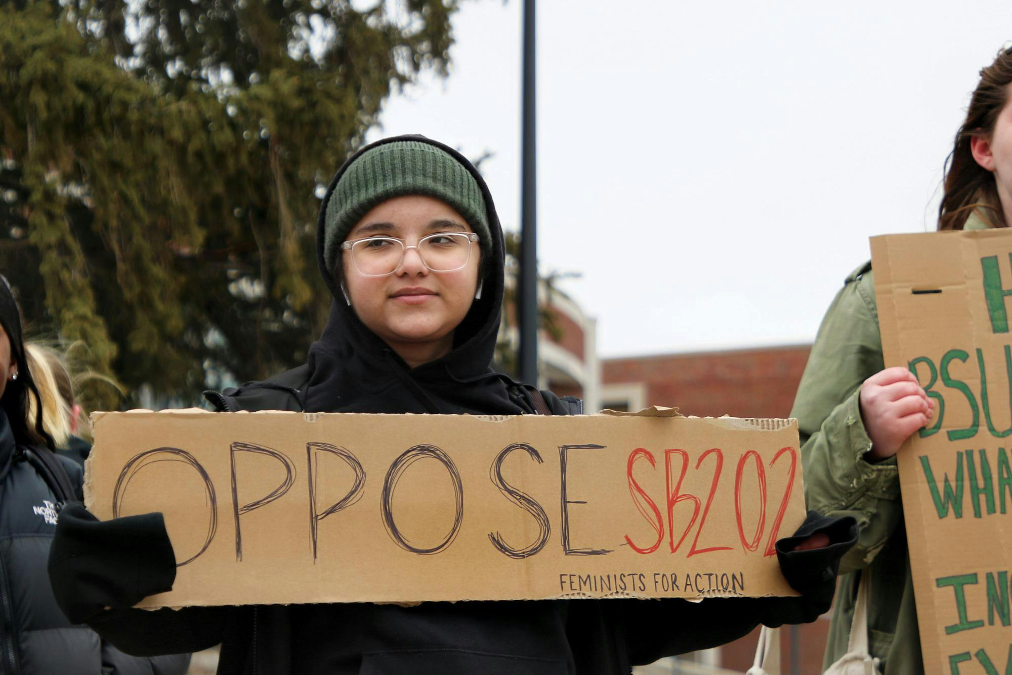 Ball State students protest at the Scramble Light Feb. 28, 2024. Protestors were voicing opposition to Indiana's Senate Bill 202, which passed the day prior in the Indiana House. Kate Farr, DN