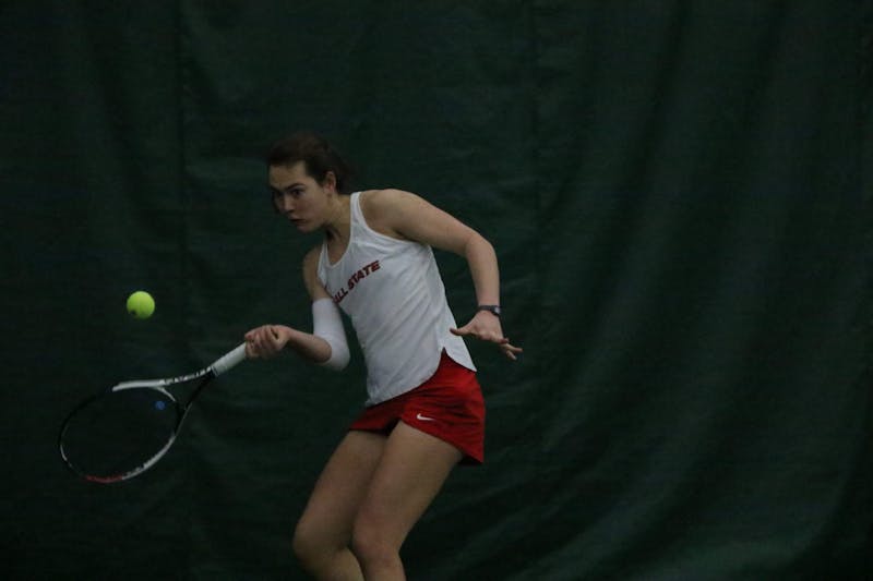 Sophomore Livia Lukacs returns a volley during her match against Louisville Jan. 24, 2020, at Muncie YMCA. Lukacs went on to win her match in two sets. Evan Weaver, DN