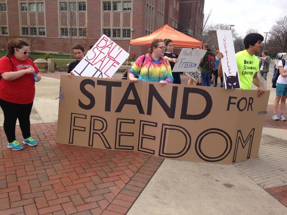 Ball State’s International Justice Mission and organizations around campus stood at the Scramble Light on April 9 to raise awareness for human trafficking .DN PHOTO KARA BERG