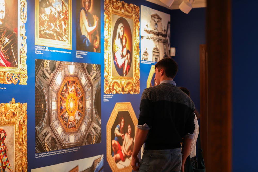 <p>Patrons admire the new Beyond the House of Medici exhibition March 28 at the David Owsley Art Museum. Andrew Berger, DN</p>