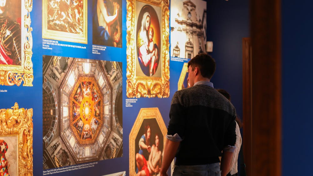 Patrons admire the new Beyond the House of Medici exhibition March 28 at the David Owsley Art Museum. Andrew Berger, DN