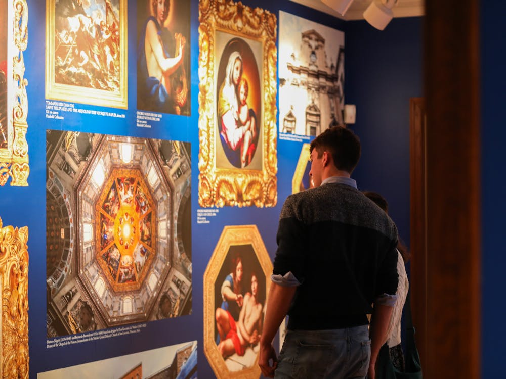 Patrons admire the new Beyond the House of Medici exhibition March 28 at the David Owsley Art Museum. Andrew Berger, DN