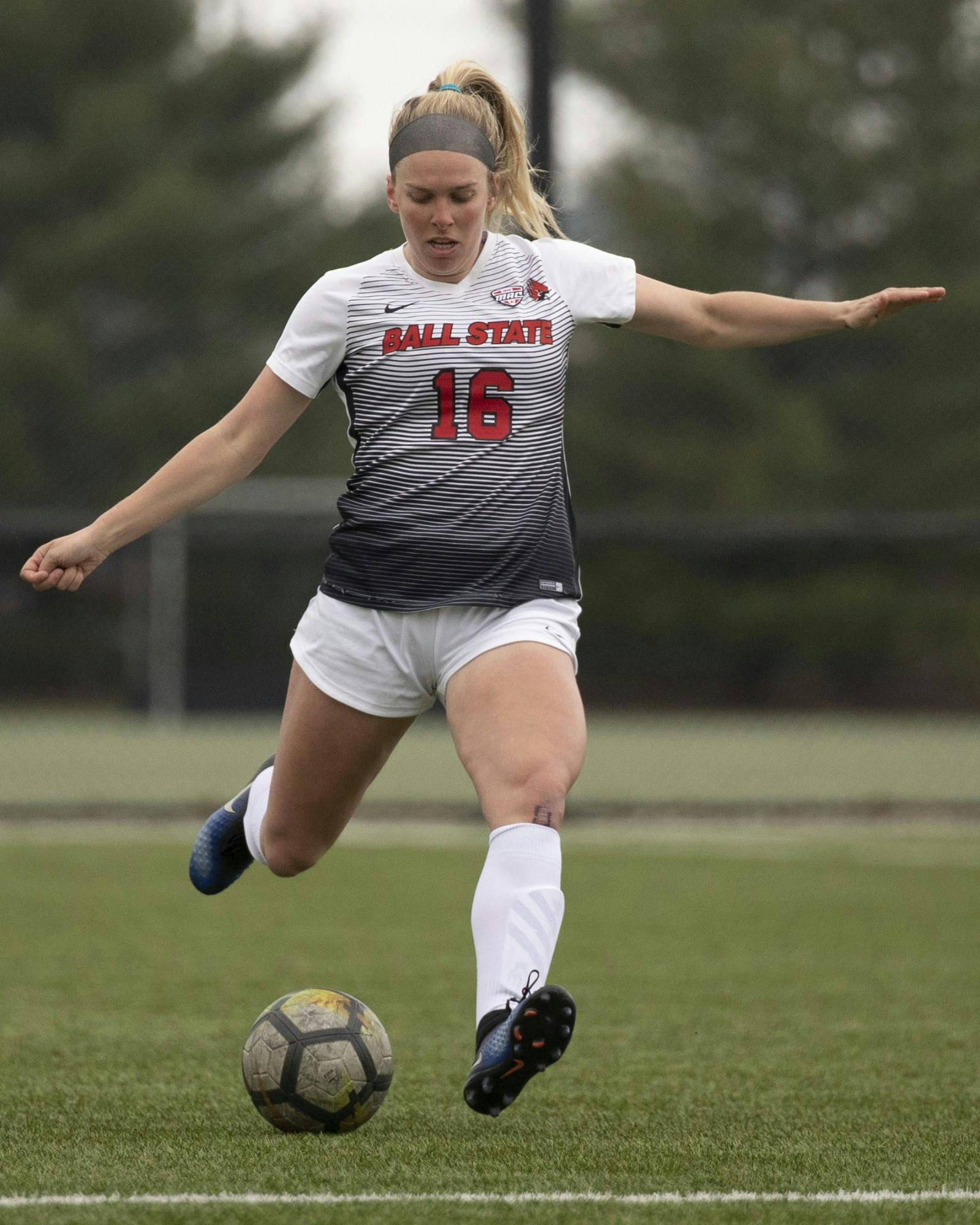 Cardinals senior midfielder Melissa Diceman kicks the ball March 26, 2021, at Briner Sports Complex. The Cardinals won 2-1 in overtime. Jacob Musselman, DN