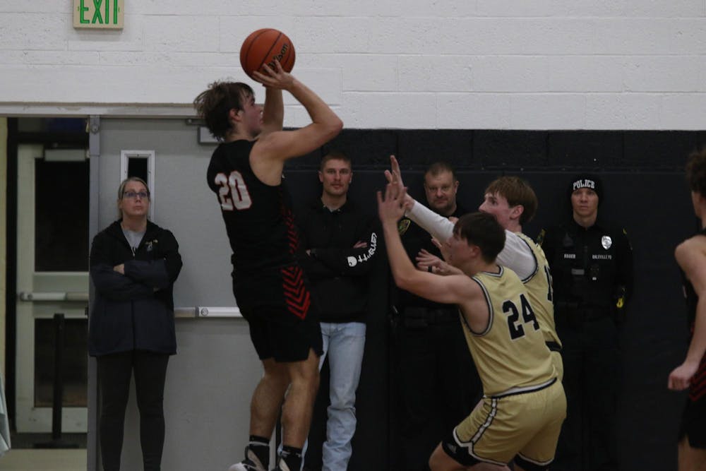 <p>Wapahani senior Isaac Andrews shoots Feb. 16 during the Raiders' game Daleville at Daleville High School. Andrews finished the game with 34 points. Zach Carter, DN.</p>