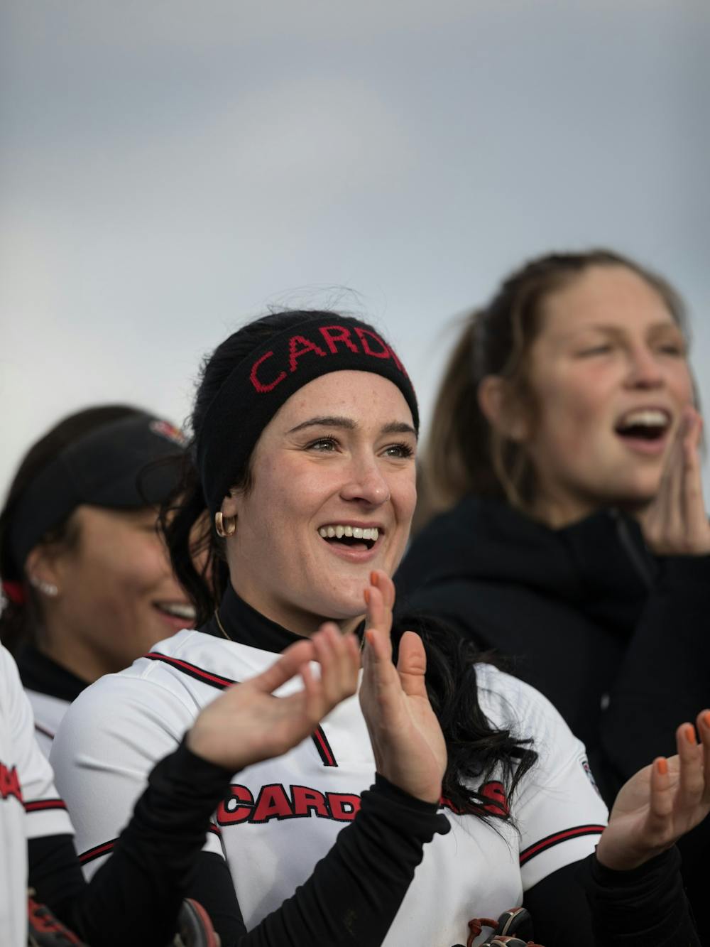 Senior Faith Hensley sings the Ball State fight song along with her teammates after the second game during the second game of Ball State Softball's doubleheader against Kent State April 1 at the First Merchants Ballpark Complex. The Cardinals will take on Kent State again April 2 at 1:00 p.m. at the First Merchants Ballpark Complex, completing their short stay at home. Eli Houser, DN
