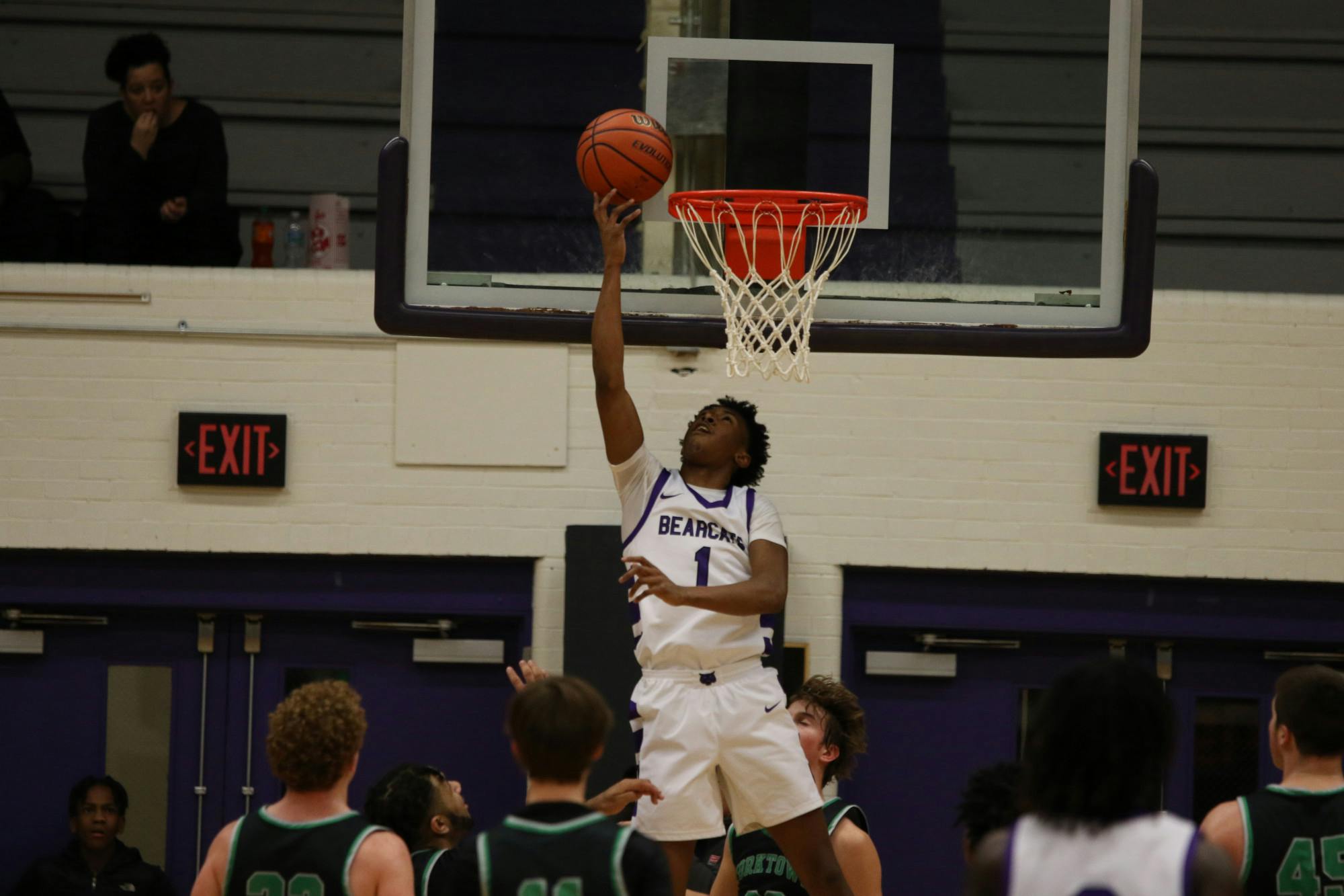 Bearcats senior guard Daniel Harris attempts a layup Feb 14. at Muncie Central Fieldhouse. He would go on to hit the game-winning three-pointer. Zach Carter, DN
