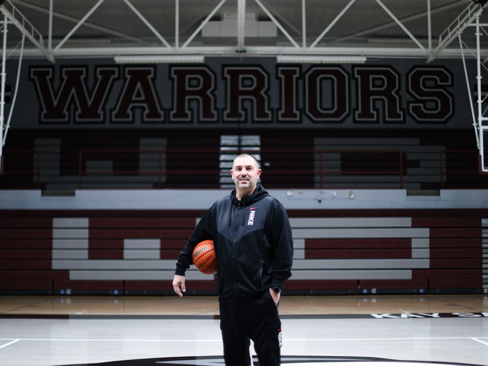 Wes-Del Boys Basketball head coach John McGlothin poses in the gym March 6 at Wes-Del Middle/High School in Gaston, Ind. Jacy Bradley, DN