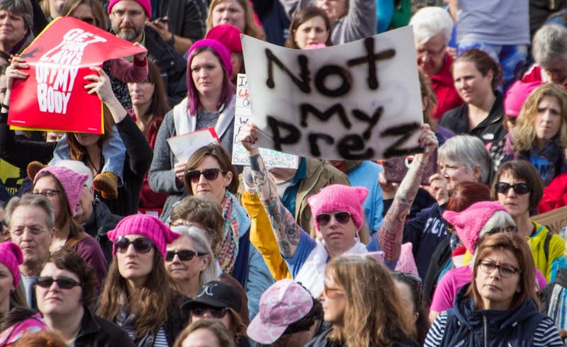 An estimated 4,500 to 5,000 people gathered outside the Indiana Statehouse on Jan. 21 for the Indianapolis Women's March, according to Indiana State Police. The rally was held in conjunction with hundreds of marches nationwide to protest the presidency of Donald Trump and support the rights of women, immigrants, LGBTQ and people of various religions. Grace Ramey // DN
