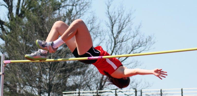 Freshman Regan Lewis clears the bar in the high jump at the Ball State Challenge at the Briner Sports Complex on Saturday, April 16, 2016. DN PHOTO ALLYE CLAYTON