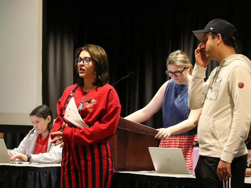 Sen. Addy Morey presents a committee report on behalf of the Student Safety Committee May 1 at the L.A. Pittenger Student Center during a Student Government Association meeting. Landon Jones, DN 