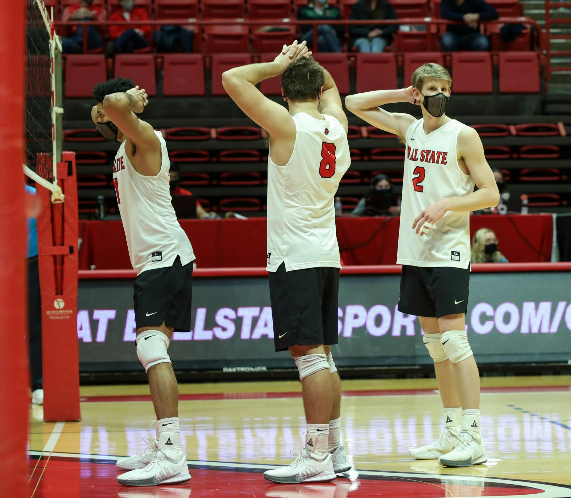 Junior middle attacker Felix Egharevba, graduate student outside attacker Blake Reardon and junior outside attacker Kaleb Jenness wait for the ball to be served Feb. 20, 2021, at John E. Worthen Arena. Ball State won against the Lions 3-0. Jaden Whiteman, DN