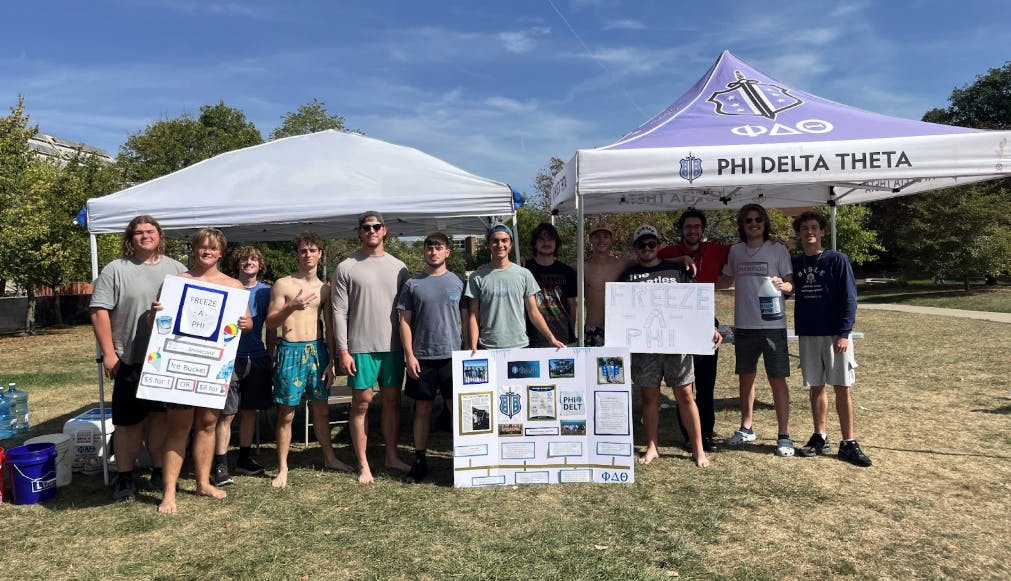 The brothers of Phi Delta Theta pose with their signs and posters.

Addison Hampshire, NewsLink Indiana