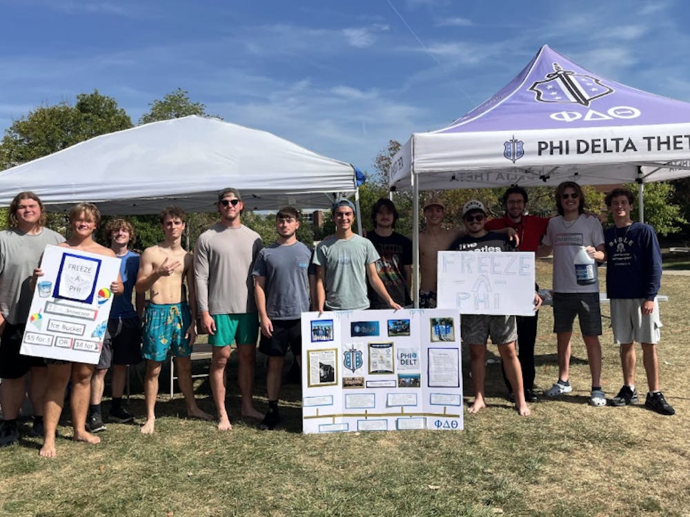 The brothers of Phi Delta Theta pose with their signs and posters.
Addison Hampshire, NewsLink Indiana