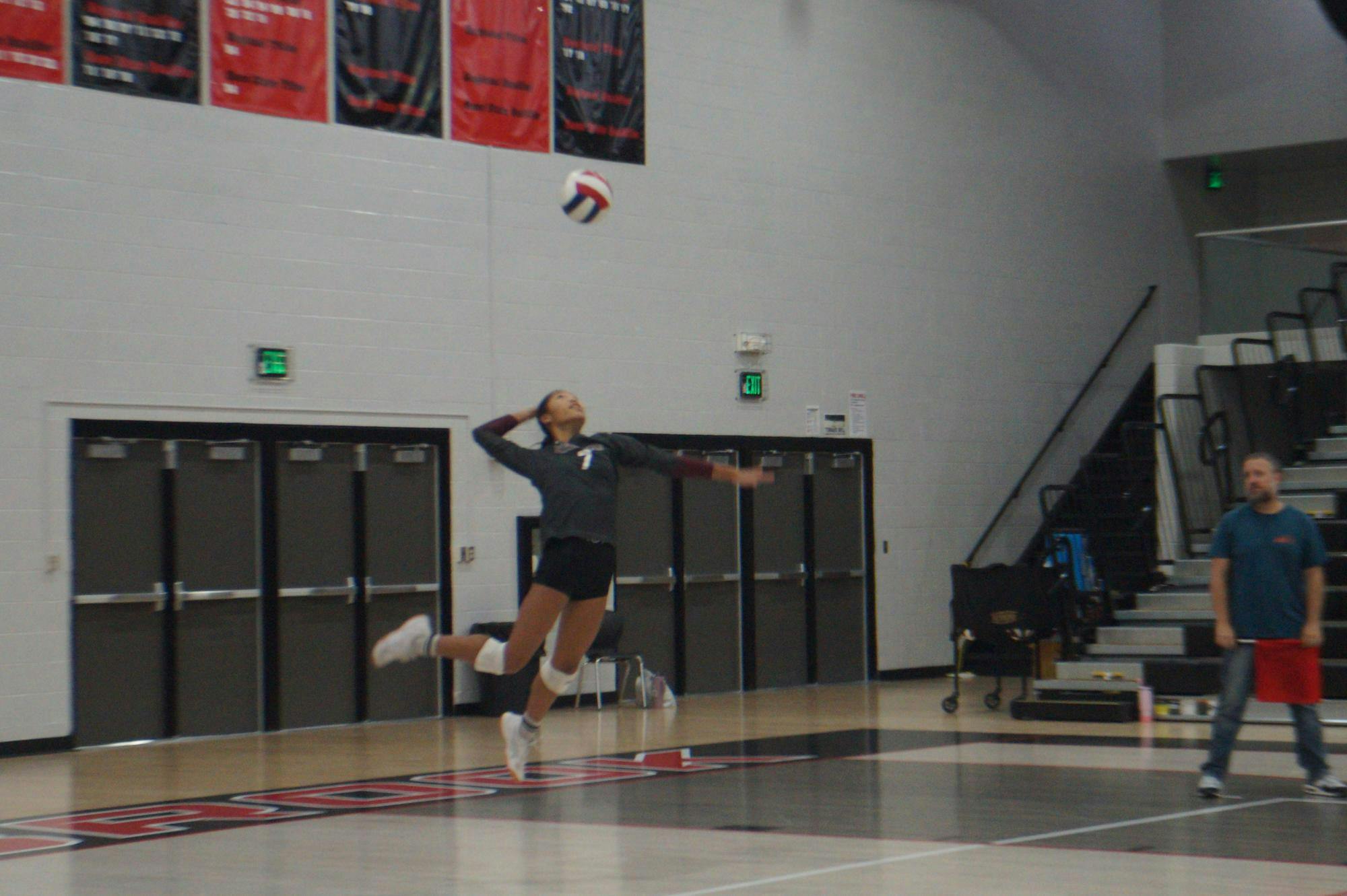Bearcat teammates show support from the bench when Muncie Central earns a point. Junior Kendall Kahle earned a point for Muncie after spiking the ball for a kill against the Connersville Spartans on Sept. 30, 2025. PHOTO BY MADISON WARD.
