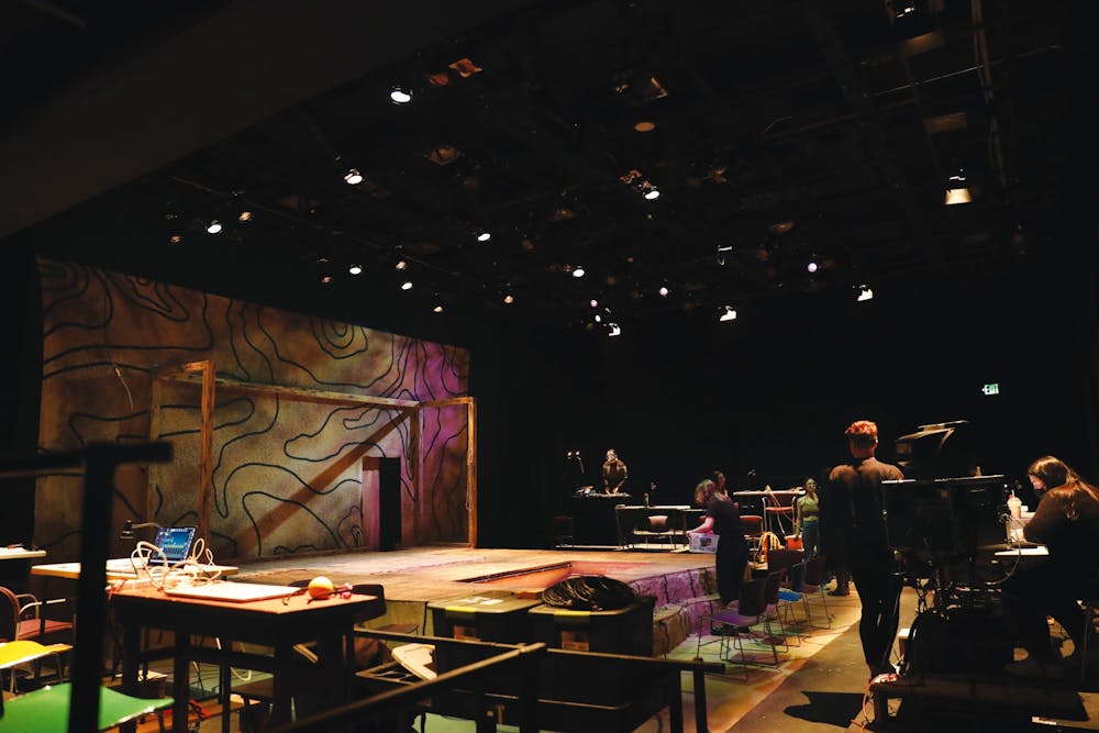 <p>Cast and crew members of “Skin and Bones” prepare for a rehearsal April 4 in Strother Theatre. “Skin and Bones,” a musical written by two Ball State alumni, opens April 8. <strong>Rylan Capper, DN</strong></p>