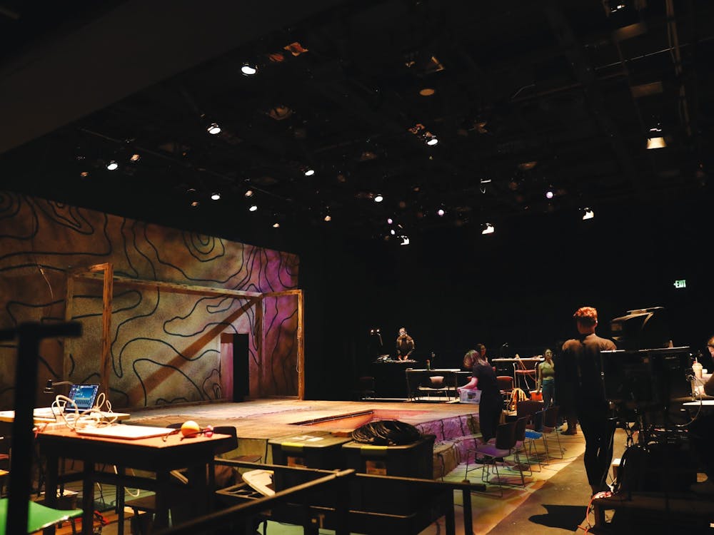 Cast and crew members of “Skin and Bones” prepare for a rehearsal April 4 in Strother Theatre. “Skin and Bones,” a musical written by two Ball State alumni, opens April 8. Rylan Capper, DN