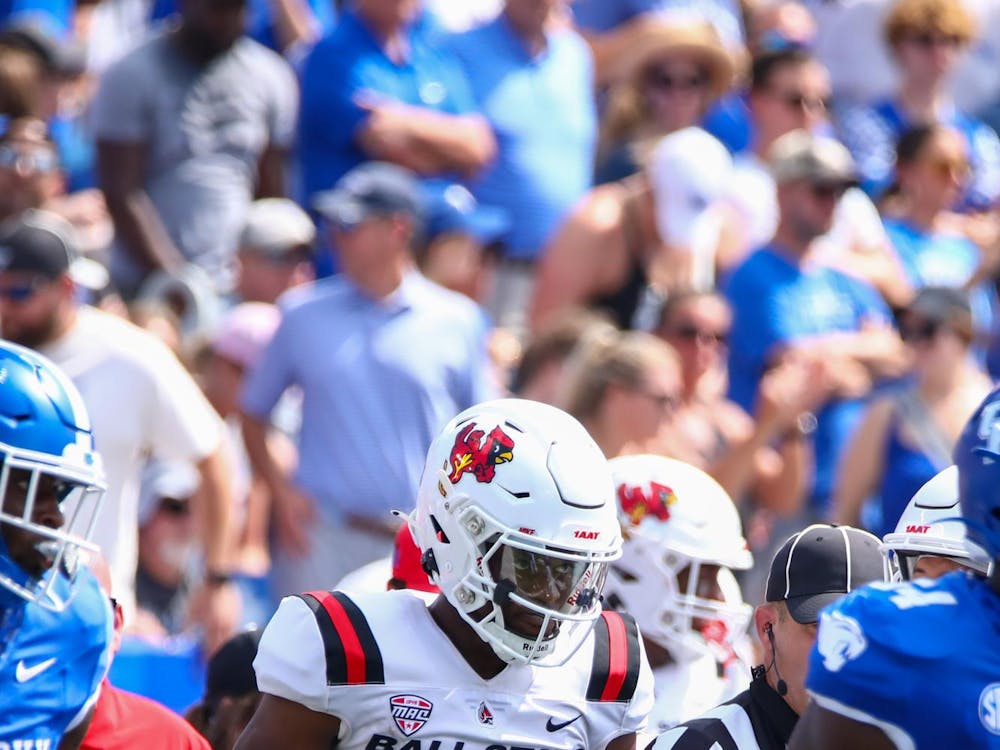 Redshirt sophomore quarterback Kiael Kelly celebrates a play against Kentucky Sept. 2. Kelly was mainly utilized in Run Pass Option plays as Ball State fell 44-14 to the Wildcats. Daniel Kehn, DN