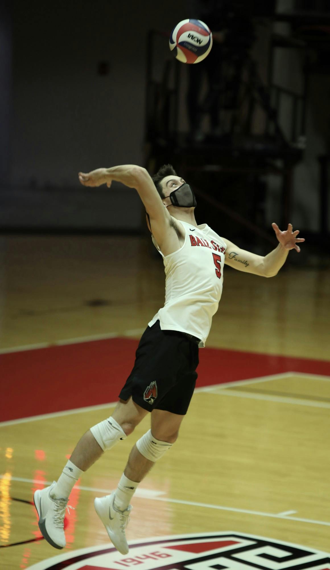 Senior setter Quinn Isaacson serves the ball Feb 27, 2021, in John E. Worthen Arena. The Cardinals lost 3-2 to the Buckeyes. Rylan Capper, DN
