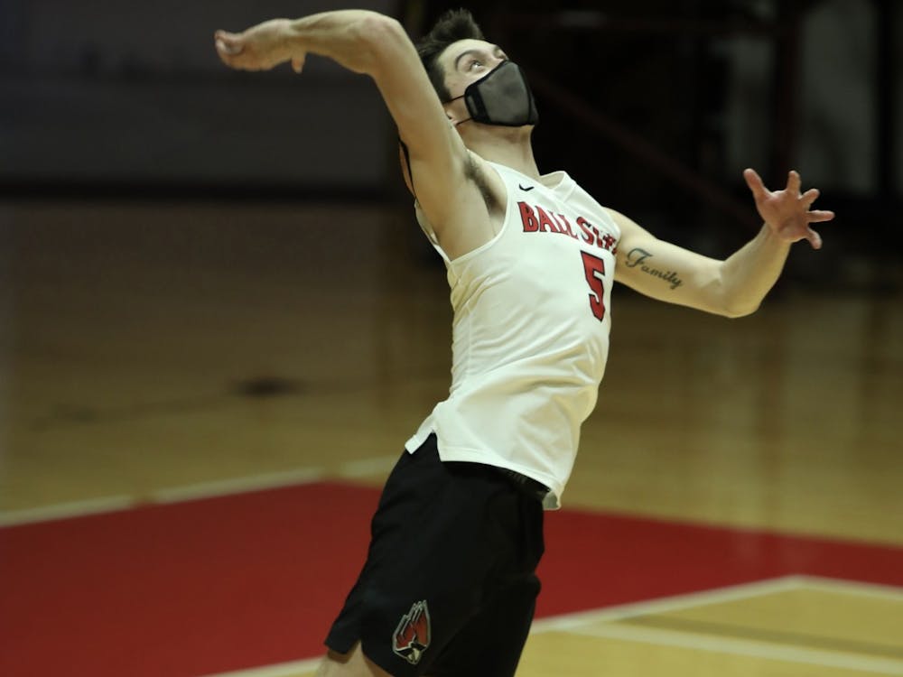 Senior setter Quinn Isaacson serves the ball Feb 27, 2021, in John E. Worthen Arena. The Cardinals lost 3-2 to the Buckeyes. Rylan Capper, DN