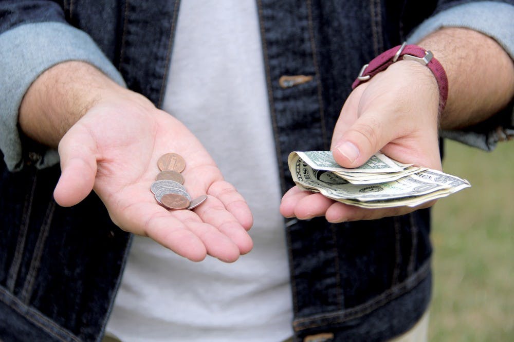 Nick Siano got an alert from the bank when trying to pay the busar’s office that he had $4.63 in his account. Paige Grider, DN