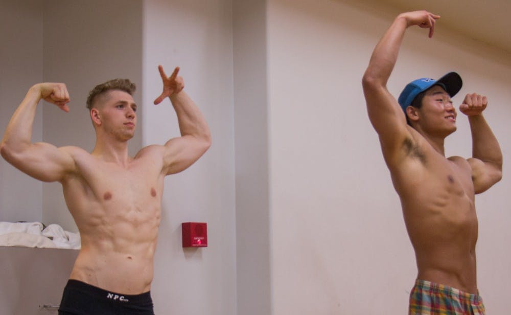 <p>Jack Southard and Kevin Zhang practice their poses at the Recreational Center April 11 for the upcoming 2018 Mr. and Ms. Ball State Bodybuilding Competition. <strong>Eric Pritchett, DN</strong></p>